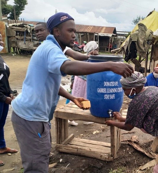 TEACHING TO USE SOAP AND WATER FOR HYGIENE